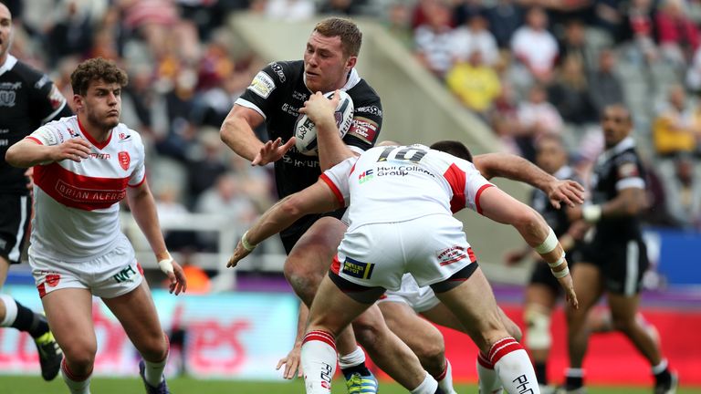 NEWCASTLE UPON TYNE, ENGLAND - MAY 22: Scott Taylor of Hull FC (C) tackled by Mitch Allgood of Hull KR during the First Utility Super League match between 