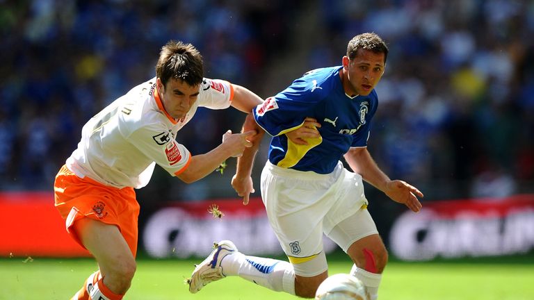 Michael Chopra of Cardiff City battles with Seamus Coleman of Blackpool during the Coca-Cola Championship Playoff Final between 