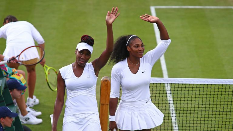 LONDON, ENGLAND - JUNE 30:  Venus and Serena Williams of The United States celebrates victory during the Ladies Doubles first round match against Andreja K