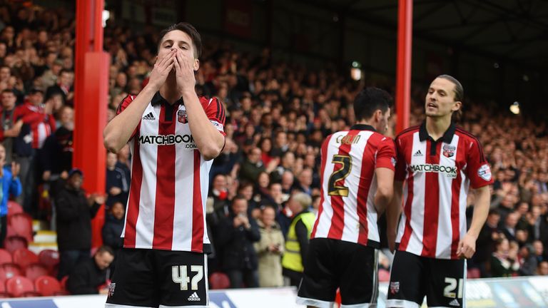 Brentford's Sergi Canos (right) celebrates scoring their first goal