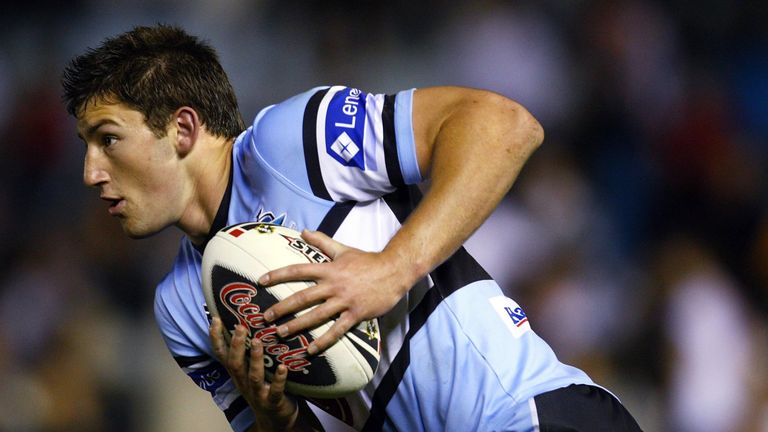 SYDNEY, AUSTRALIA - AUGUST 18:  Mitch Brown of the Sharks runs the ball during the round 23 NRL match between the Cronulla-Sutherland Sharks and the Wests 