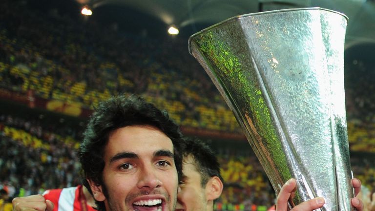 Silvio of Atletico Madrid lifts the Europa League trophy in 2012