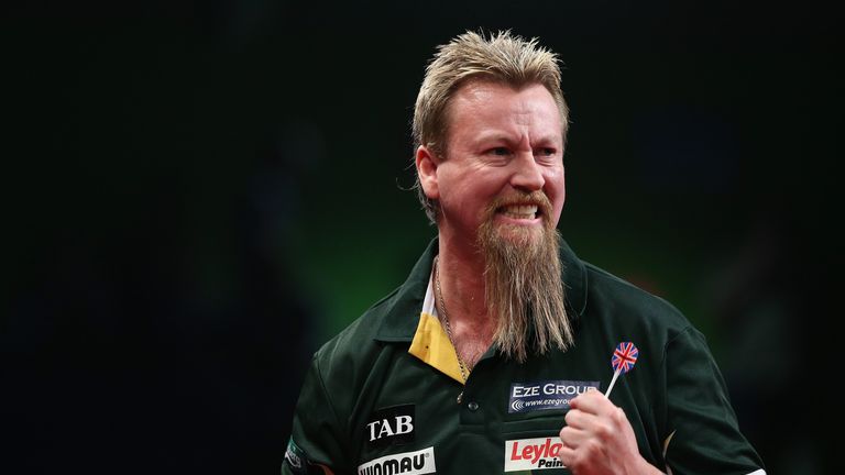 AUCKLAND, NEW ZEALAND - AUGUST 28:  Simon Whitlock of Australia reacts to a score during the Auckland Darts Masters at The Trusts Arena on August 28, 2015 