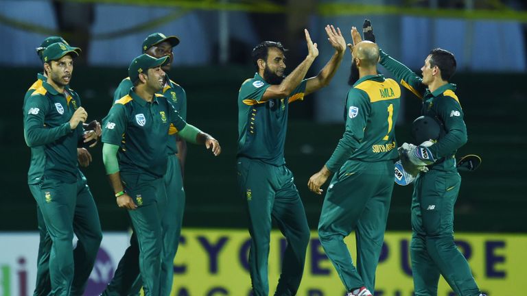 South Africa's Imran Tahir (C) celebrates with teammates after dismissing West Indies batsman Marlon Samuels during sixth ODI in Saint Kitts in June 2016