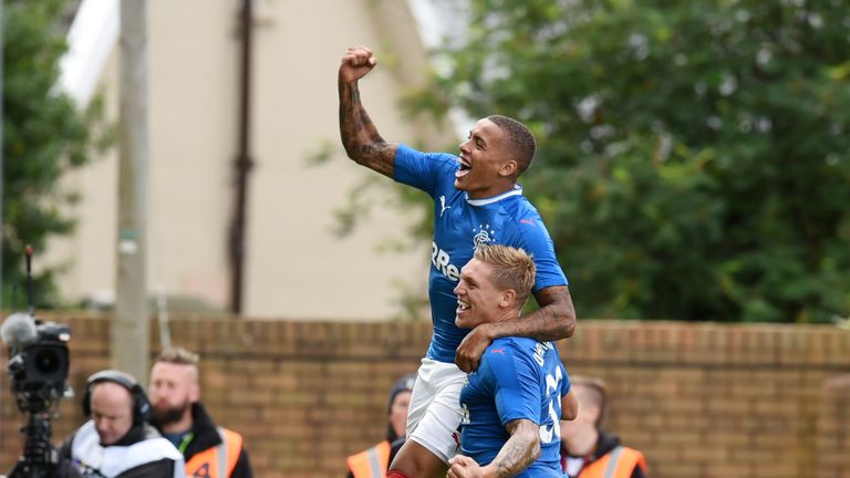 Rangers' James Tavernier (left) celebrates with Martyn Waghorn after opening the scoring