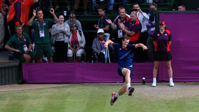 Andy Murray celebrates after defeating Roger Federer in the Men's Singles Tennis Gold Medal match