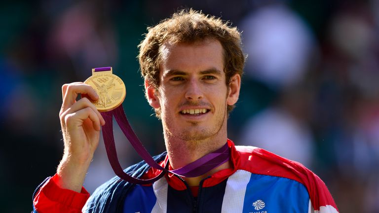 Andy Murray poses with his gold medal at the end of the men's singles of the London 2012 Olympic Games