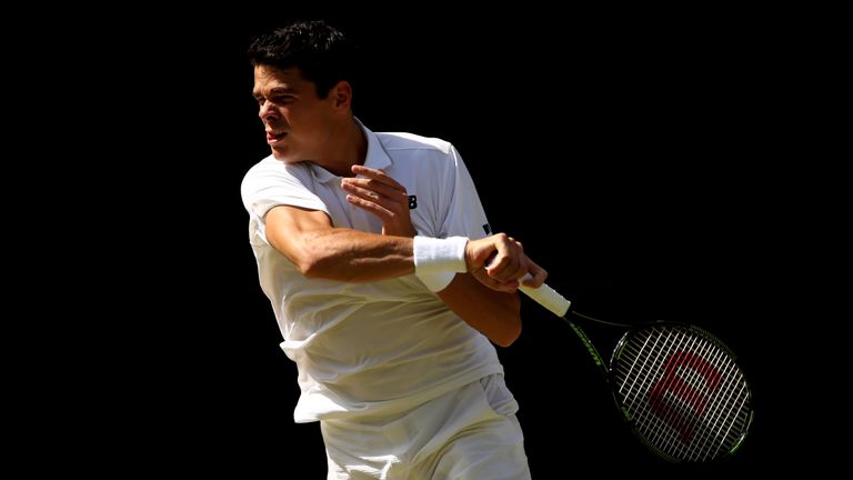 Milos Raonic plays a forehand during the Men's Singles Final against Andy Murray at Wimbledon