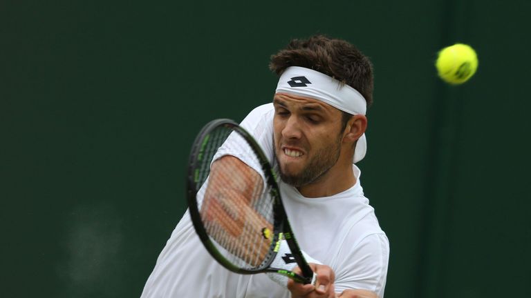 Czech Republic's Jiri Vesely returns against Tomas Berdych