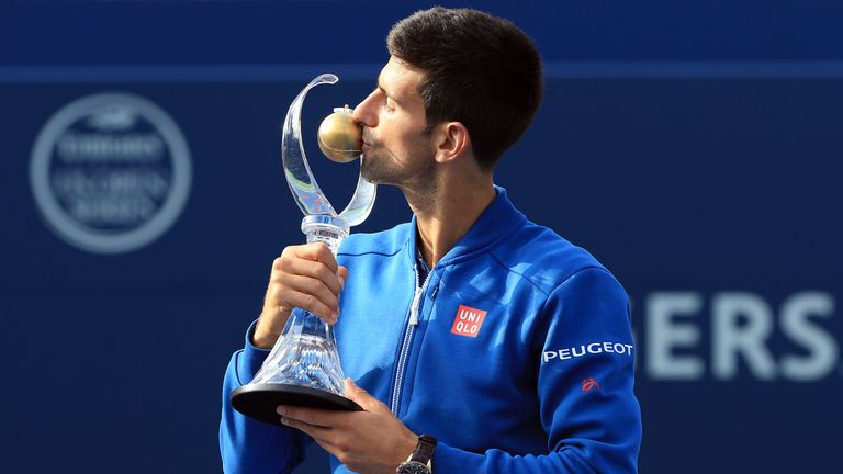 Novak Djokovic of Serbia celebrates winning the Singles Final over Kei Nishikori of Japan during Day 7 of the Rogers Cup at the Aviv