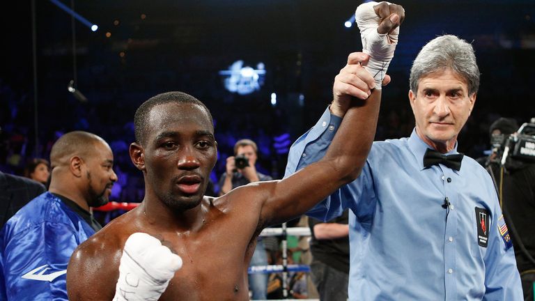Terrence Crawford reacts after defeating Bredis Prescott
