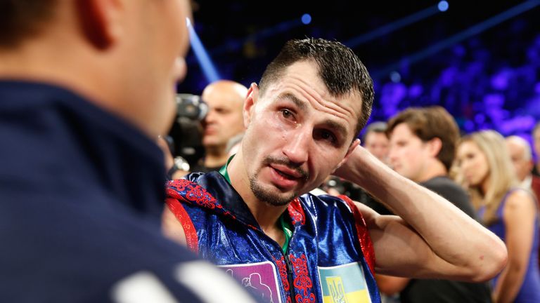 LAS VEGAS, NV - JULY 23:  Viktor Postol of Ukraine talks with a member of his team after his loss to WBO junior welterweight champion Terence Crawford.
