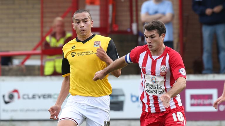 ACCRINGTON, ENGLAND - AUGUST 29:  Terry Gornell of Accrington Stanley prepares to have a shot at goal under pressure from Rod McDonald of Northampton Town 