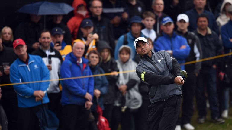 Jason Day chips onto the 12th green during his second round on day two of the 2016 Open at Royal Troon