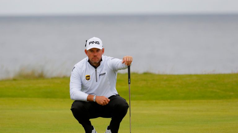 Lee Westwood of England looks on lines up a putt on the 5th green during the second round on day two of the 145th Open
