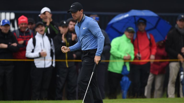 Northern Ireland's Rory McIlroy putts out on the 16th green during his second round on day two of the 2016 British Open Golf Championship at Royal Troon in