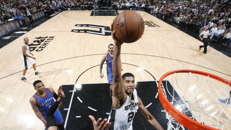 SAN ANTONIO, TX - MAY 10:  Tim Duncan #21 of the San Antonio Spurs goes to the basket against the Oklahoma City Thunder in Game Five of the Western Confere