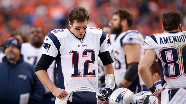 DENVER, CO - JANUARY 24:  Tom Brady #12 of the New England Patriots reacts in the second half against the Denver Broncos in the AFC Championship game at Sp
