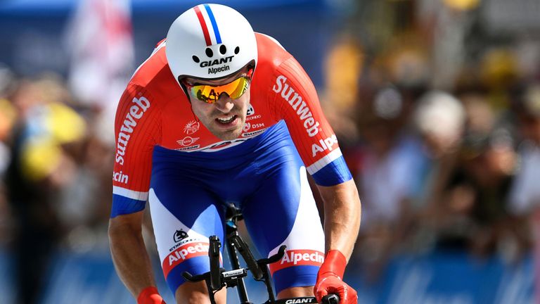 Netherlands' Tom Dumoulin crosses the finish line at the end of the 17 km individual time-trial, the eighteenth stage of the 103rd edition of the Tour de F