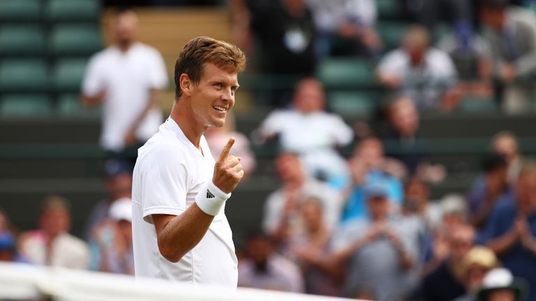 Tomas Berdych of The Czech Republic celebrates victory over Lucas Pouille