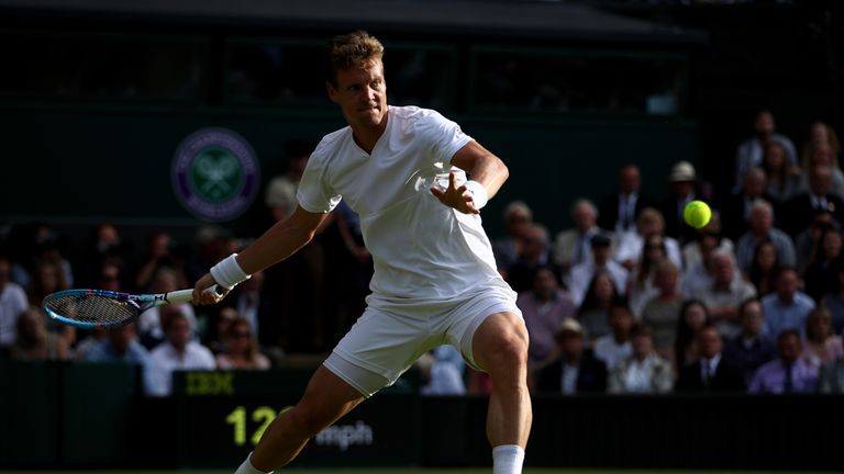 LONDON, ENGLAND - JULY 08:  Tomas Berdych of The Czech Republic plays a forehand during the Men's Singles Semi Final match against Andy Murray of Great Bri