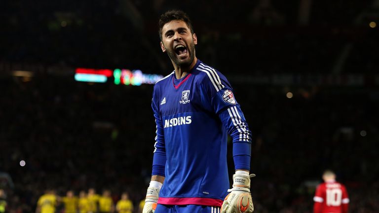 Middlesbrough's Spanish goalkeeper Tomas Mejias celebrates after saving Wayne Rooney's penalty in the shoot-out during the English League Cup fourth round 