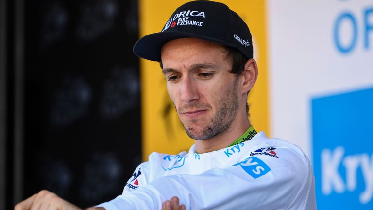 Adam Yates celebrates his white jersey of best young on the podium at the end of the 162,5 km eleventh stage of the 103rd edition of the Tour de France