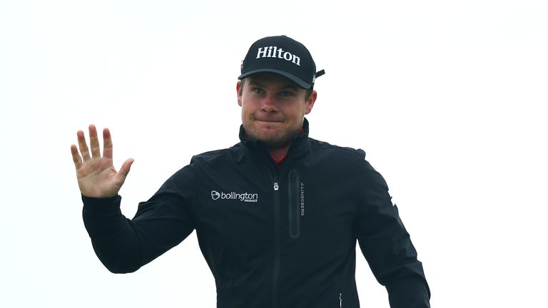 TROON, SCOTLAND - JULY 17:  Tyrell Hatton of England acknowledges the crowd after putting on the 1st during the final round on day four of the 145th Open C