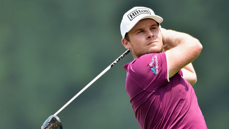 Tyrrell Hatton of England plays his shot from the sixth tee during the third round of the 2016 PGA Championship at Baltusrol