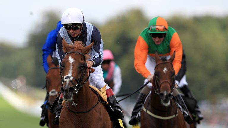 Ulysses ridden by jockey Andrea Atzeni (left) on the way to winning the BeringIce Gordon Stakes during day two of The Qatar Goodwood Festival, Goodwood.