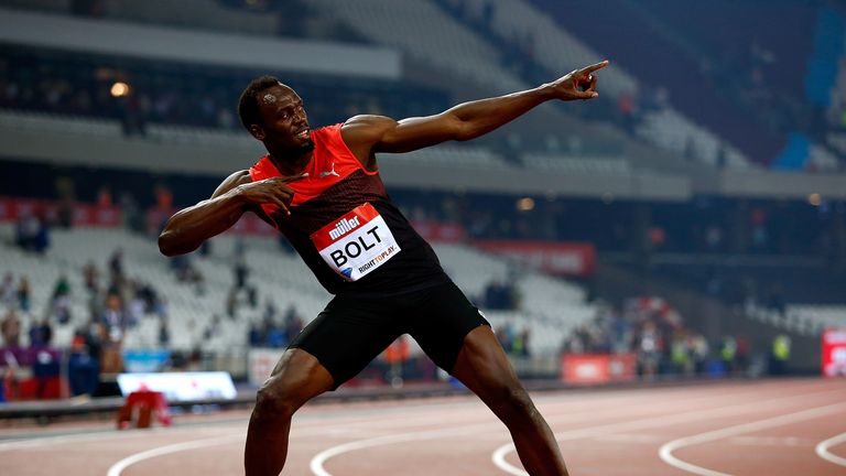 Usain Bolt celebrates after his 200m success