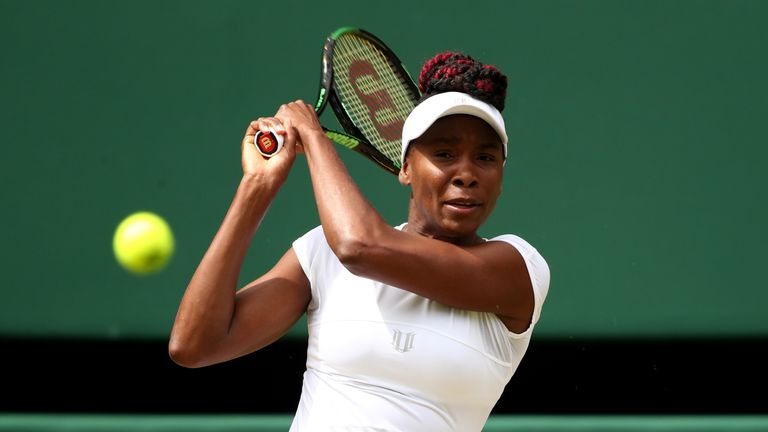 LONDON, ENGLAND - JULY 07:  Venus Williams of The United States plays a backhand during the Ladies Singles Semi Final match against Angelique Kerber of Ger