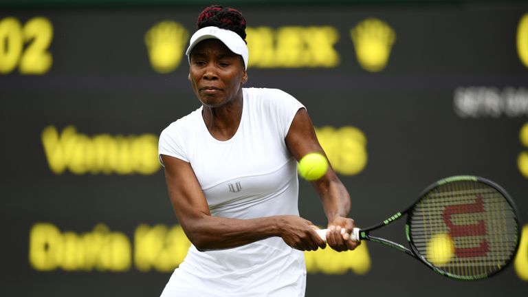 LONDON, ENGLAND - JULY 01:  Venus Williams of The United States plays a backhand during the Ladies Singles third round match against Daria Kasatkina of Rus