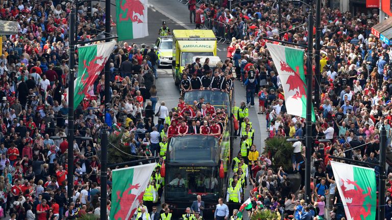 The Wales Football squad head down St Mary's street on their bus parade around Cardiff on their EURO 2016 homecoming
