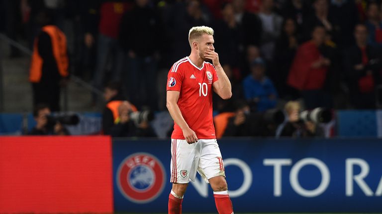 Wales' Aaron Ramsey looks dejected after being shown a yellow card during the UEFA Euro 2016, quarter final match at the Stade Pierre Mauroy, Lille.
