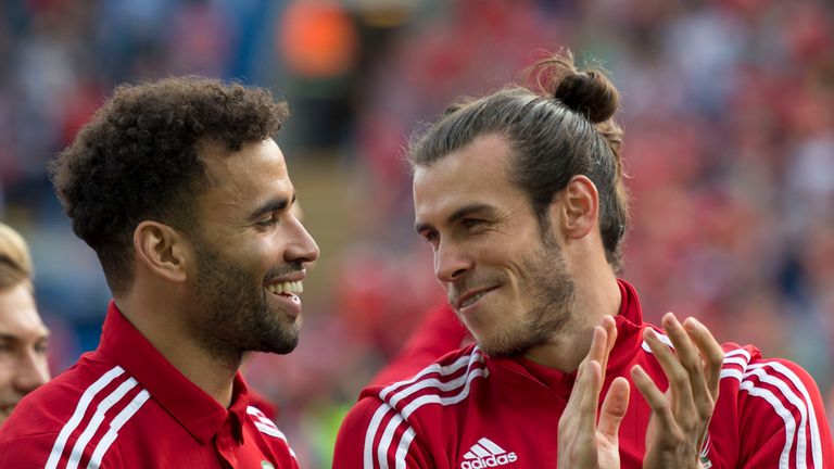 CARDIFF, WALES - JULY 08: Wales' Hal Robson-Kanu (L) and Gareth Bale (R) laugh during a ceremony at the Cardiff City Stadium on July 8, 2016 in Cardiff, Wa