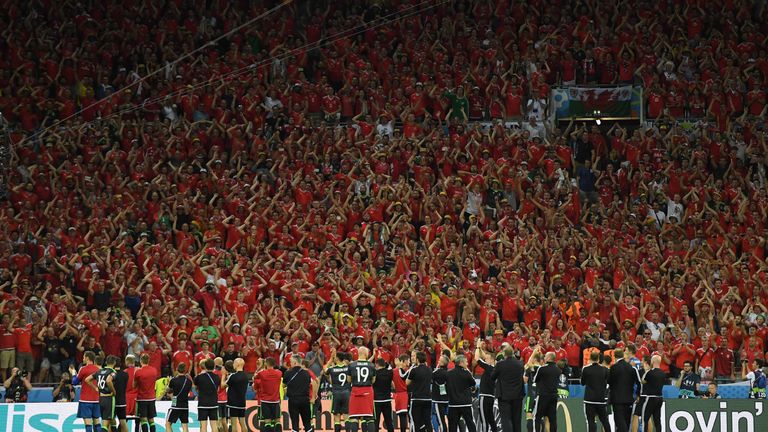 LYON, FRANCE - JULY 06:  Wales players and staffs applaud supporters after the UEFA EURO 2016 semi final match between Portugal and Wales at Stade des Lumi