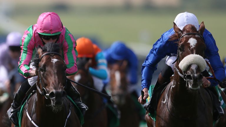 Adam Kirby riding Boynton (right) win the bet365 Superlative Stakes from War Decree at Newmarket