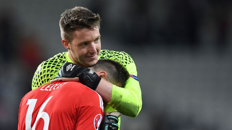 Wales' midfielder Joe Ledley (front) and Wales' goalkeeper Wayne Hennessey celebrate after the Euro 2016 quarter-final football match between Wales and Bel