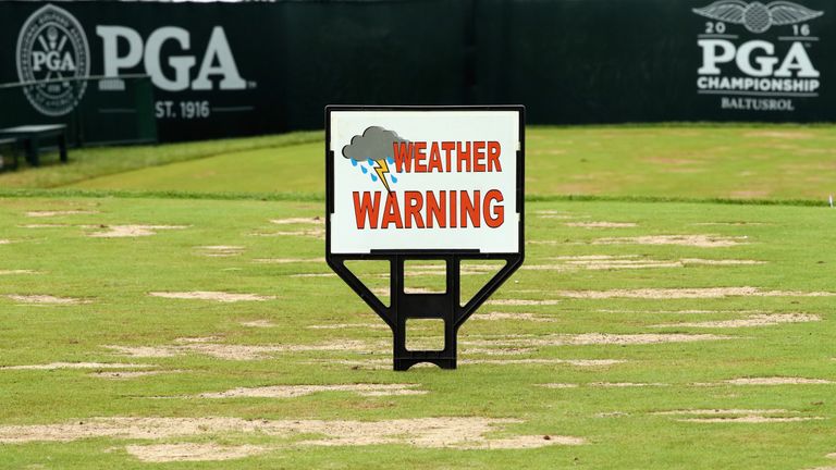 A weather warning sign is seen during a weather delay during the third round of the 2016 PGA Championship at Baltusrol Golf Club