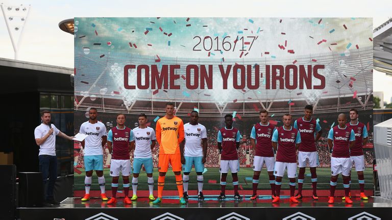 LONDON, ENGLAND - JULY 16: West Ham United players pose in the new West Ham United 2016/17 kits during the West Ham United kit launch event at the West Ham