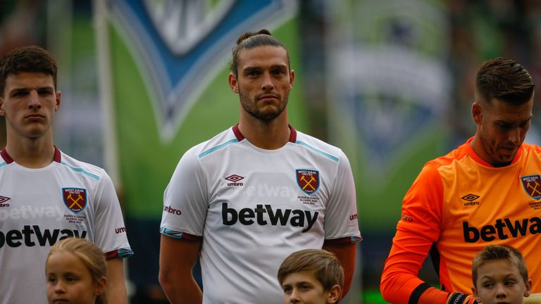 Andy Carroll wears the new West Ham away kit with Adrian sporting the goalkeeper's jersey in Seattle, Washington