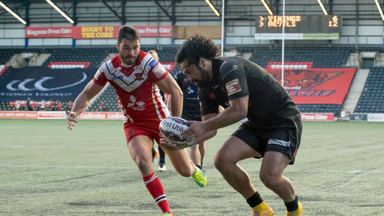 Salford's Mark Flanagan can't prevent Widnes's Patrick Ah Van from touching down for a try