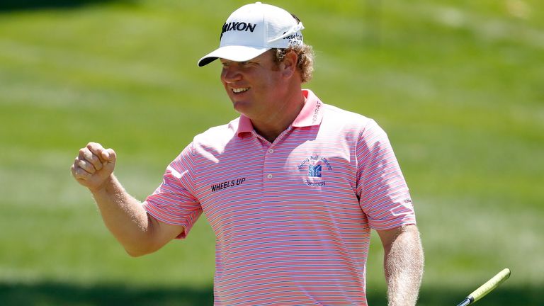 William McGirt reacts after a putt on the 18th green during the first round of the WGC - Bridgestone Invitational at Firestone