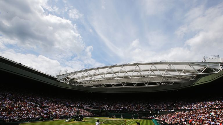General view of centre court as Roger Federer of Switzerland makes a return