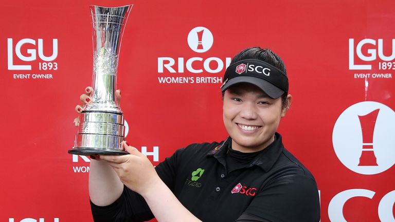 Ariya Jutanugarn of Thailand poses with the trophy following her Woburn victory