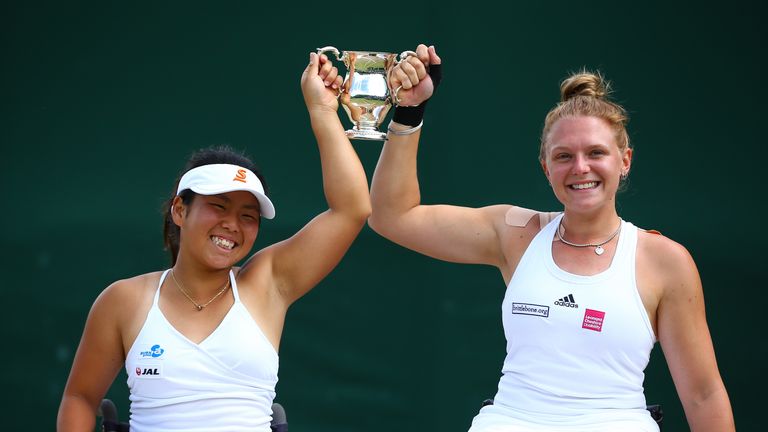 LONDON, ENGLAND - JULY 10:  Jordanne Whiley of Great Britain and Yui Kamiji of Japan hold their trophy folllowing victory in the Ladies Doubles Wheelchair 