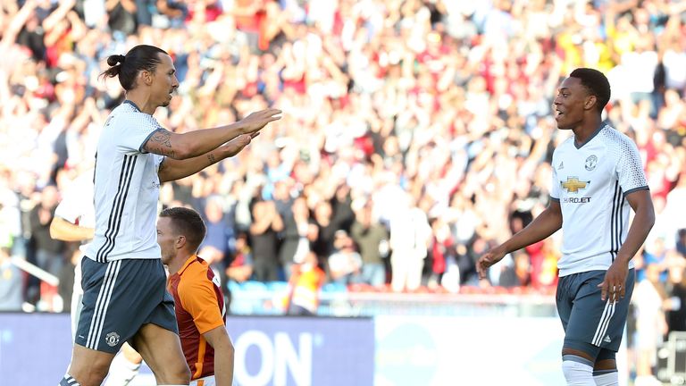 Zlatan Ibrahimovic celebrates with Anthony Martial after scoring v Manchester United's pre-season friendly with Galatasaray