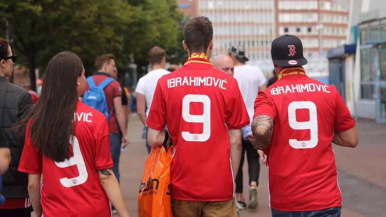 Fans wear replica home shirts celebrating Zlatan Ibrahimovic of Manchester United before a pre-season friendly match in Gothenburg, Sweden.