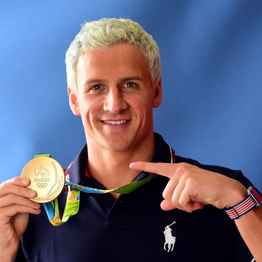 Lochte 'robbed by armed men'